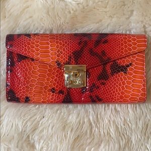 Zina Eva Faux Leather Printed Clutch